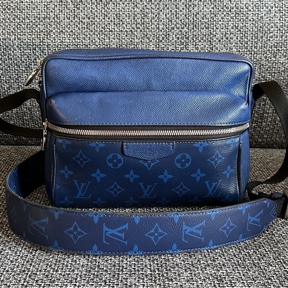 LOUIS VUITTON Taiga Monogram Outdoor Messenger in Cobalt.